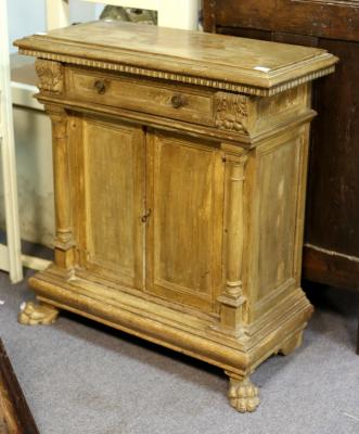 An Italian pine pedestal cupboard