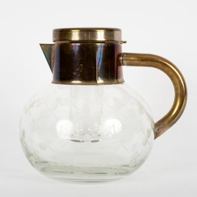An engraved glass punch jug