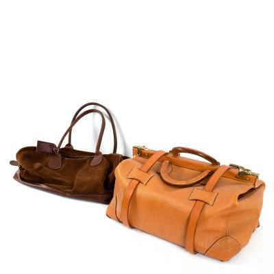 A leather travelling case, complete