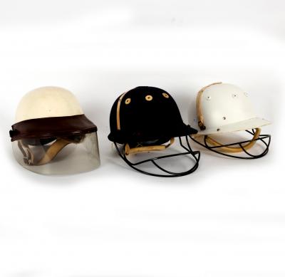 An Everoak polo helmet, and two