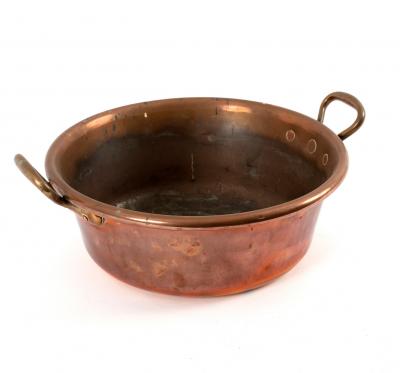 A copper two-handled preserving pan,