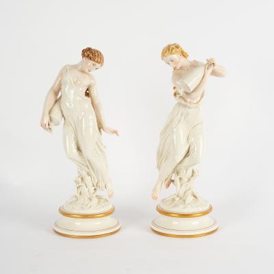 A pair of Royal Worcester figures,