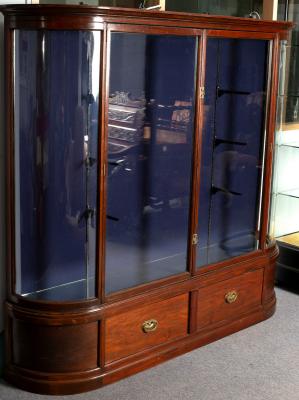 A mahogany framed display cabinet, enclosed
