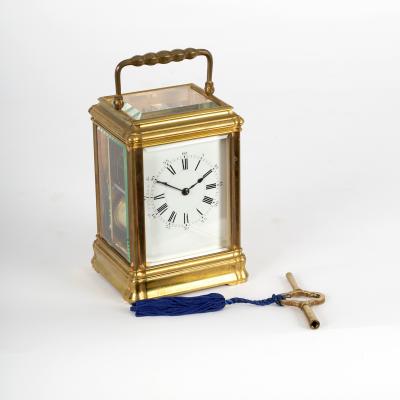 A gilt brass eight-day carriage clock