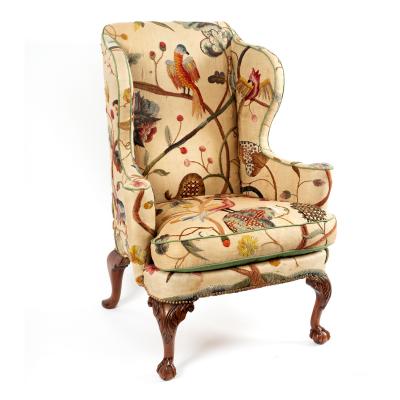 A wing back armchair of George