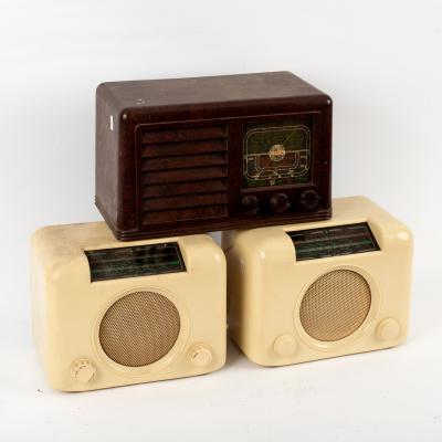 A Bush radio in a cream Bakelite case,