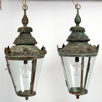 A pair of copper lanterns with crown