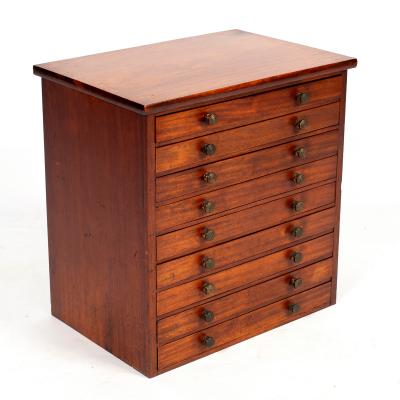 A collectors mahogany cabinet of nine