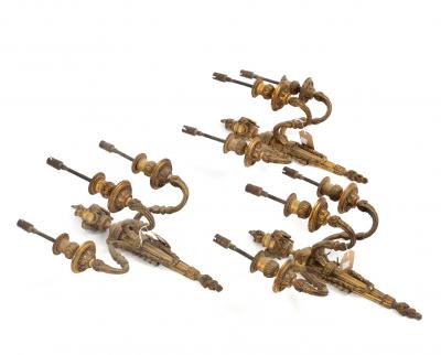 Three gilt brass three-branch,