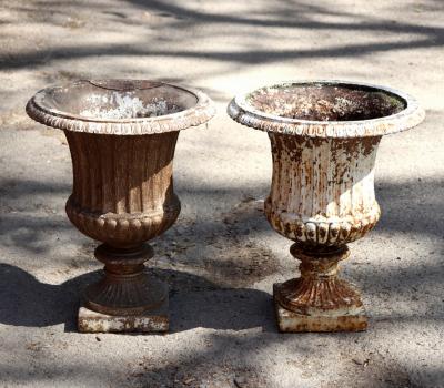 A pair of campana shaped cast iron