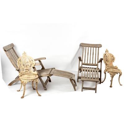 A pair of teak steamer chairs and