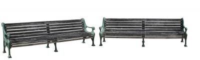 A pair of garden seats with cast
