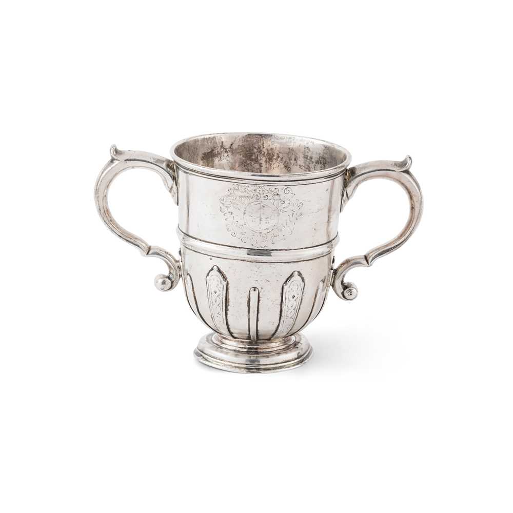 AN IRISH GEORGE I TWIN-HANDLED CUP Thomas