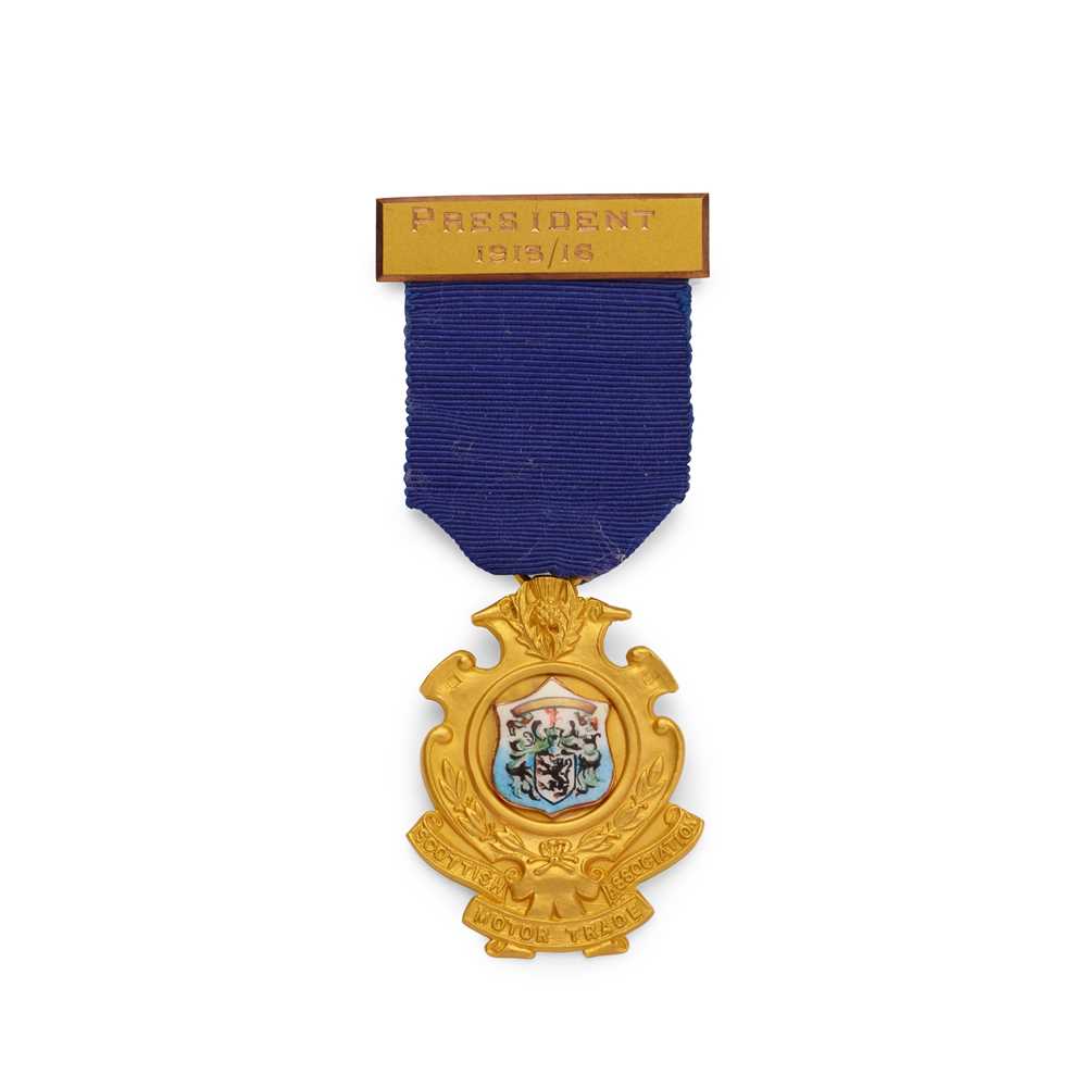 A 9CT GOLD AND ENAMEL MEDAL the