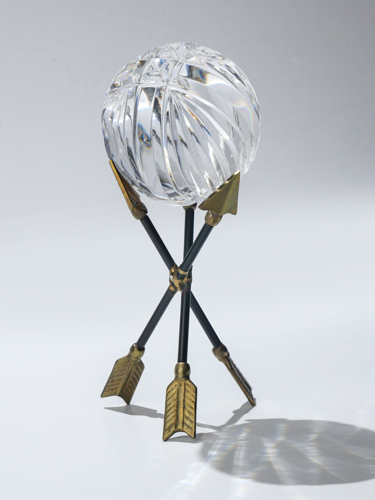 CUT CRYSTAL BALL ON BRASS STAND: