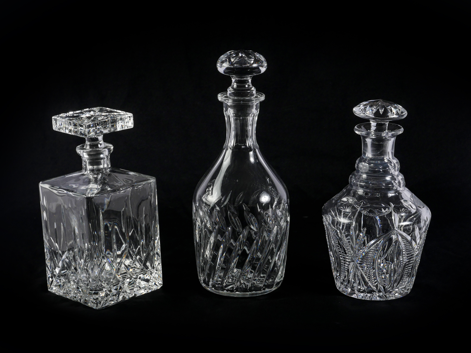 3 LEAD CRYSTAL AND CUT GLASS DECANTERS  36df8a