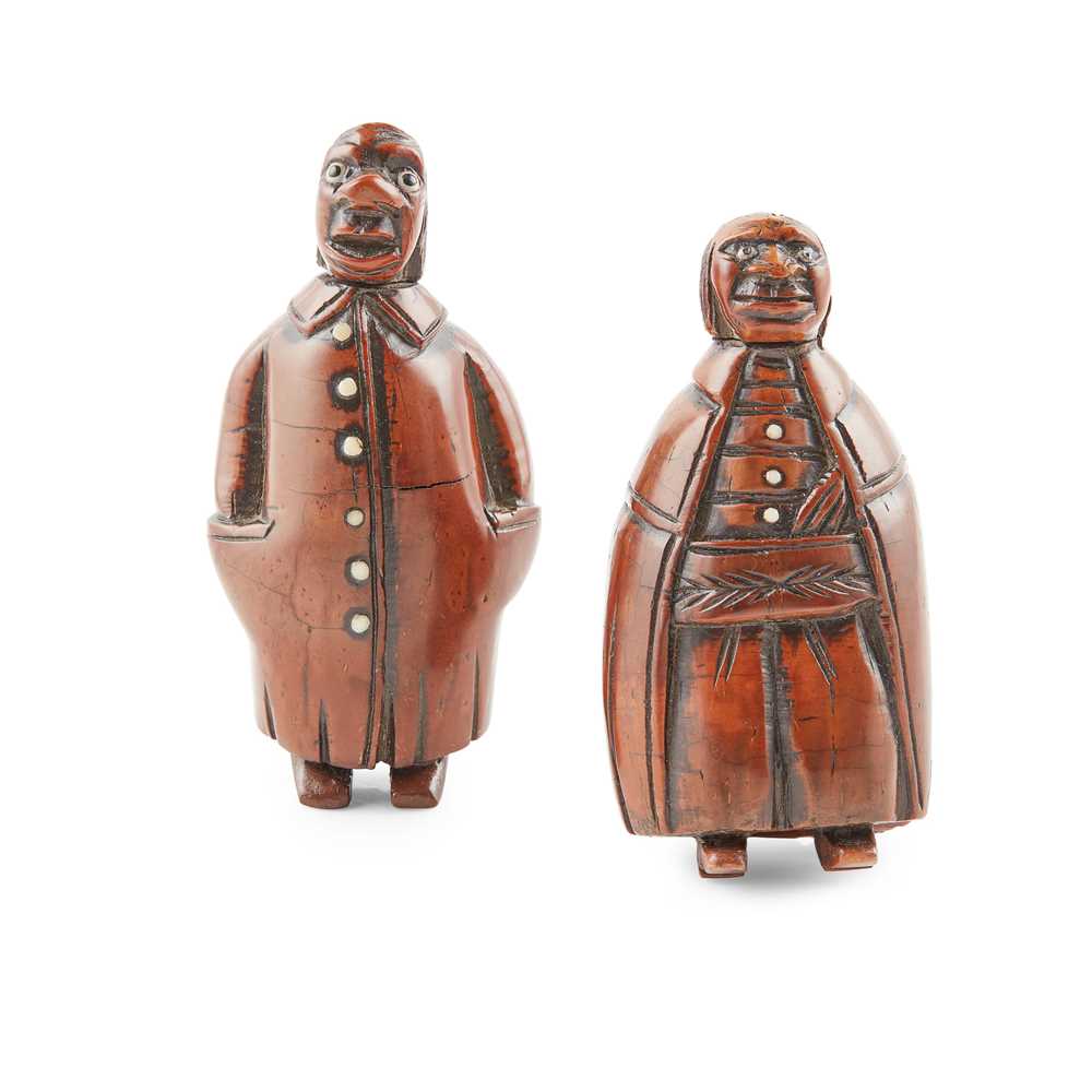 TWO CARVED COQUILLA NUT CHARACTER