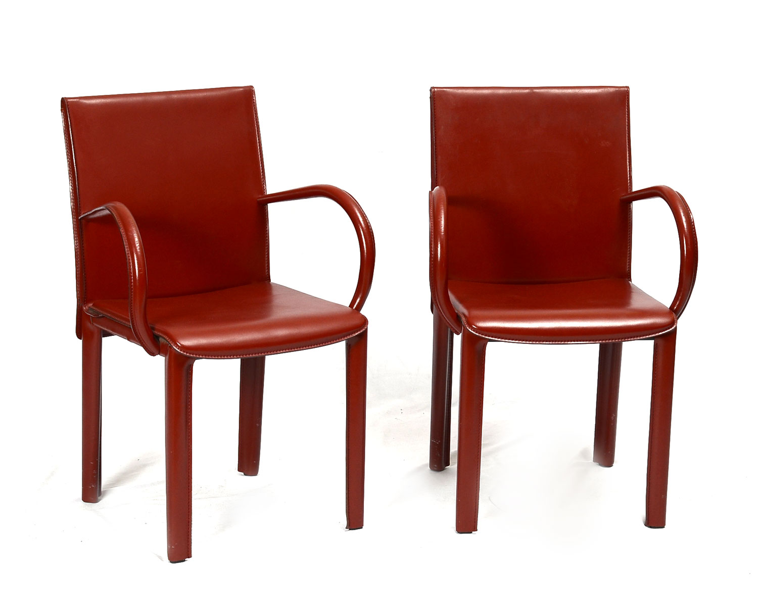 PAIR OF RED LEATHER ARMCHAIRS BY