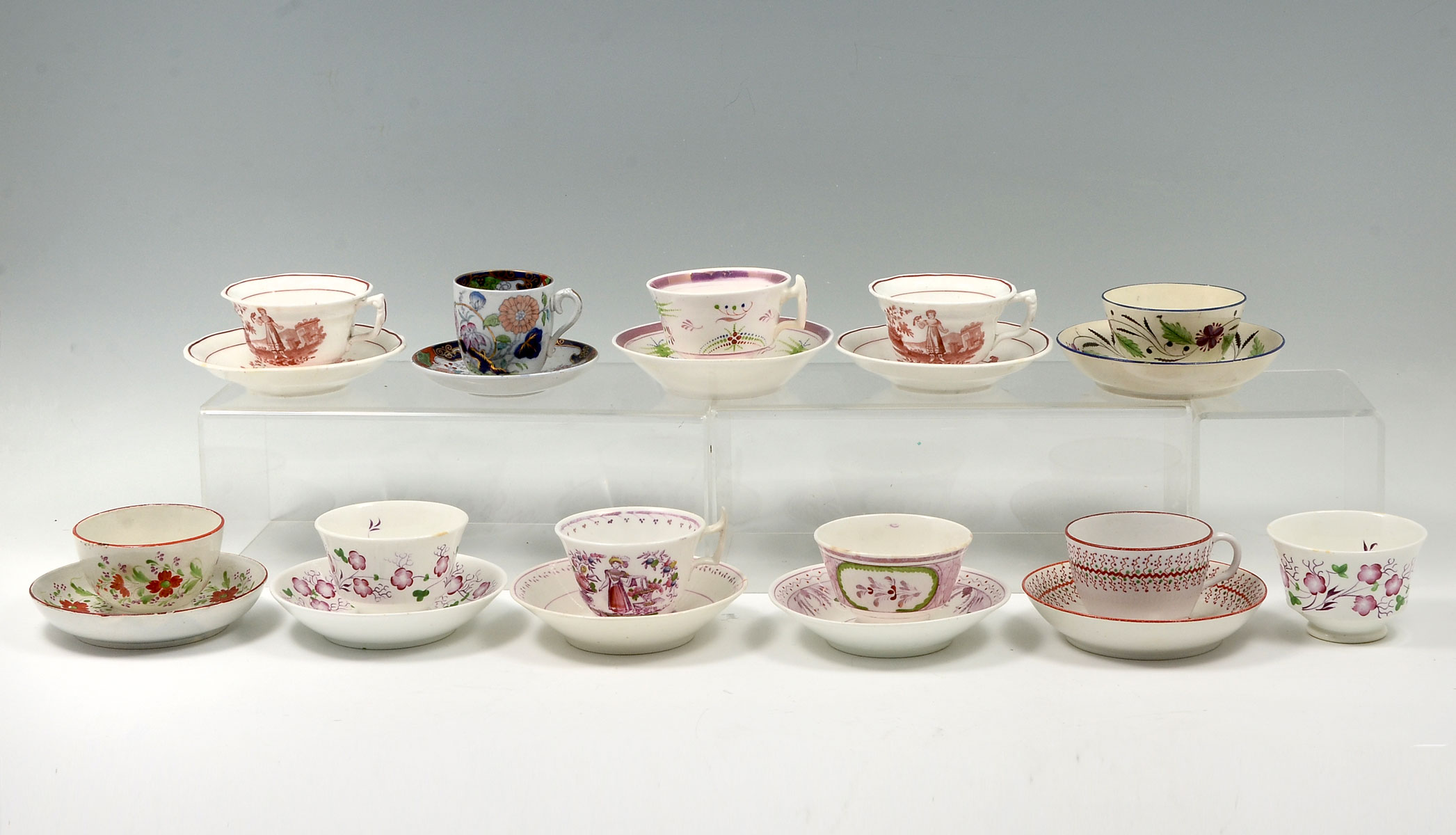 EARLY SOFT PASTE PORCELAIN CUPS & SAUCERS: