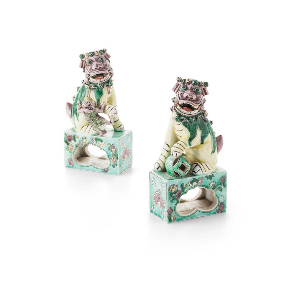 PAIR OF SANCAI-GLAZED BISCUIT BUDDHIST