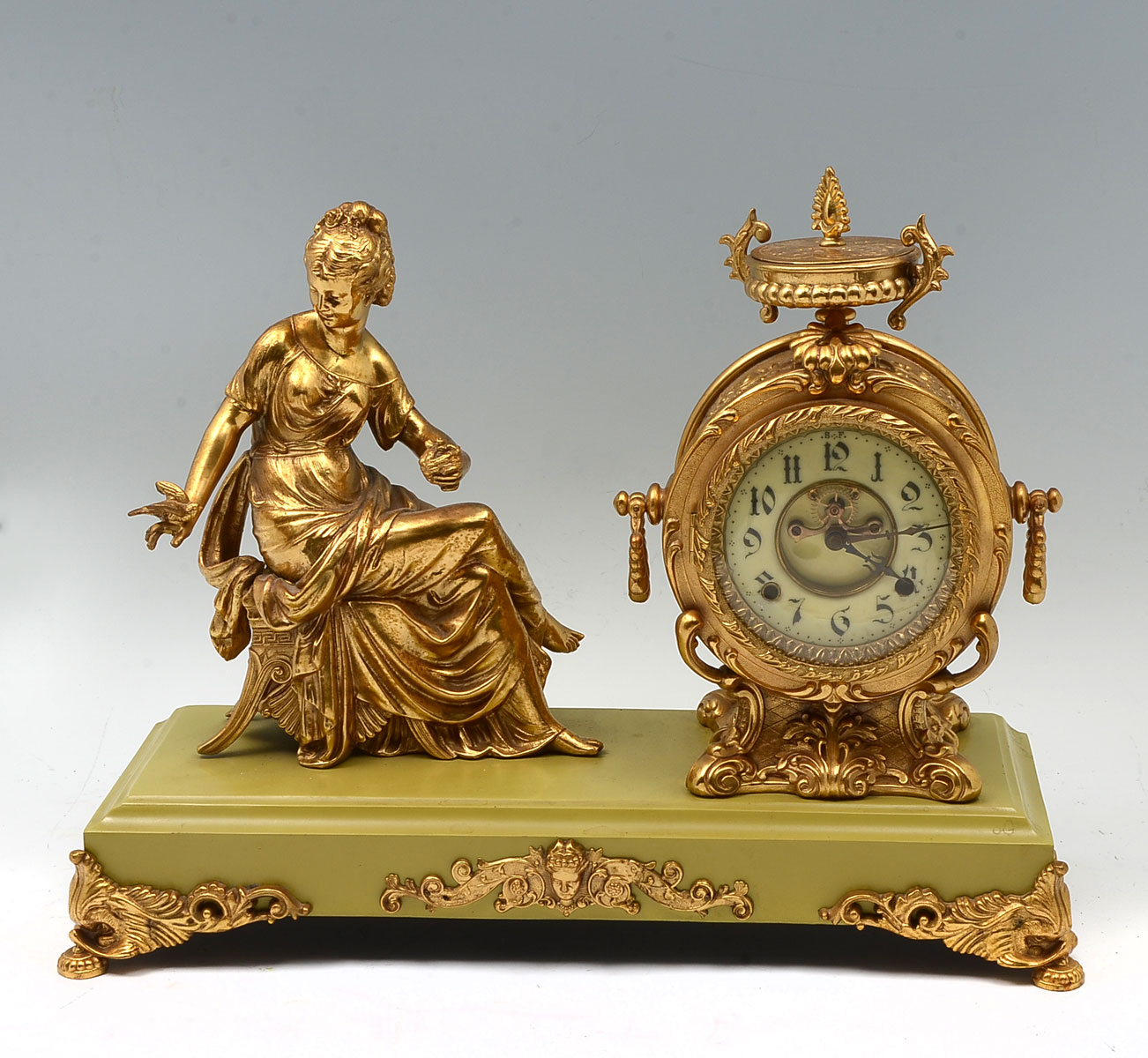 FIGURAL METAL NEW HAVEN CLOCK: Seated