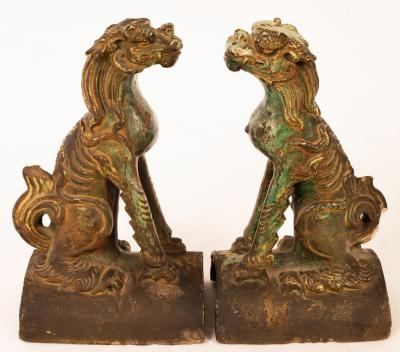 A pair of 17th Century green glazed