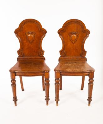 A pair of Victorian oak chairs