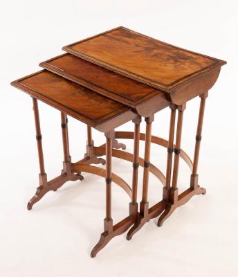 A nest of three mahogany tables, the