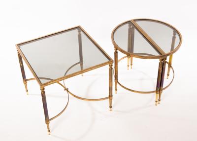 A glass and brass framed sectional table