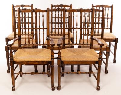 A set of eight rush seated chairs,