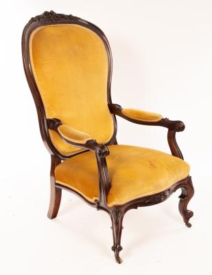 A Victorian rosewood framed open armchair