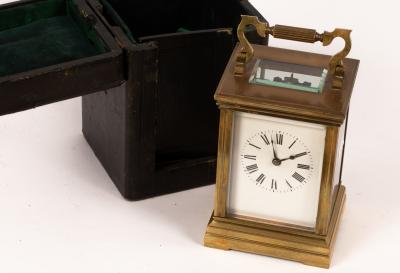 A gilt brass eight-day carriage clock,