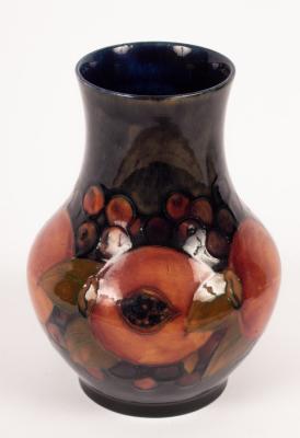 A Moorcroft vase decorated pomegranates