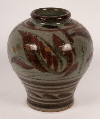 A studio pottery vase, the grey ground
