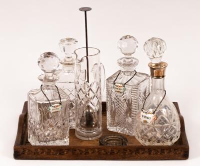 A cut glass decanter and stopper with