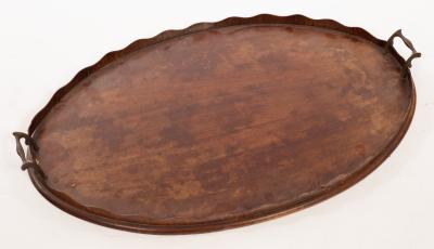 An Edwardian mahogany two-handled tray