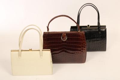 A crocodile skin brown handbag 36c8e3