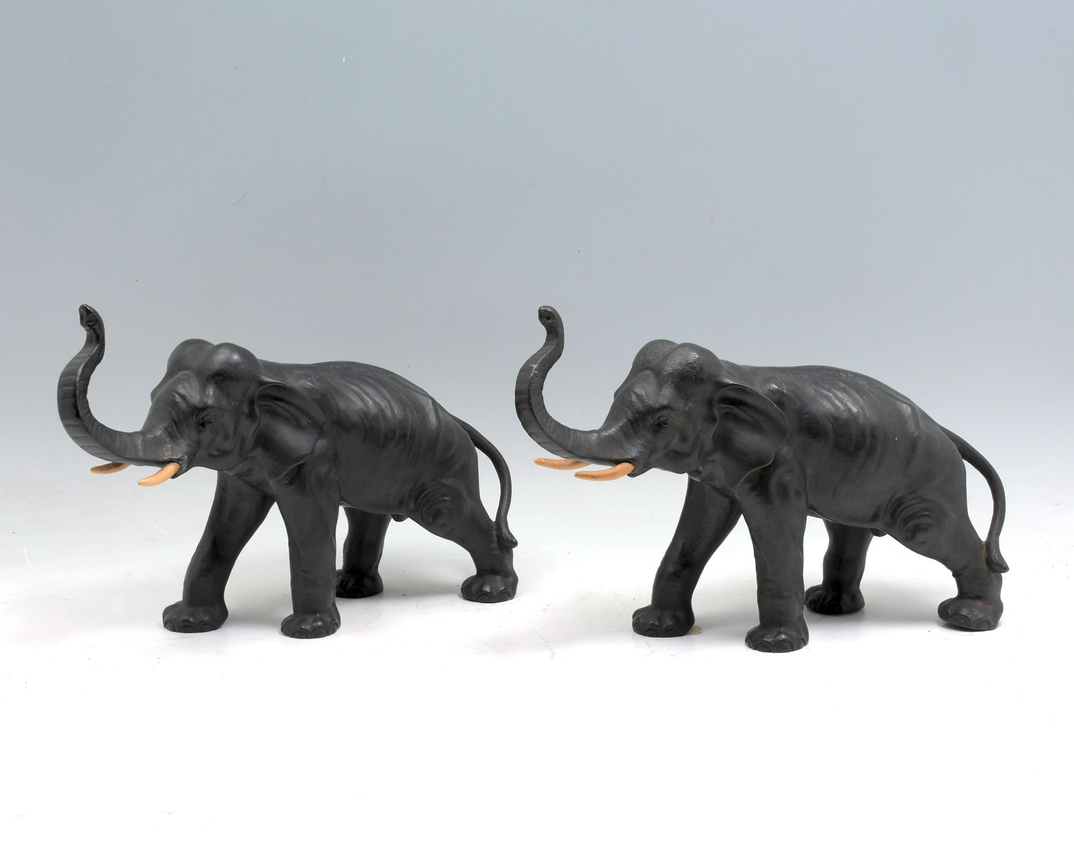 PAIR OF COPPER CLAD CHALKWARE ELEPHANTS  36ccad