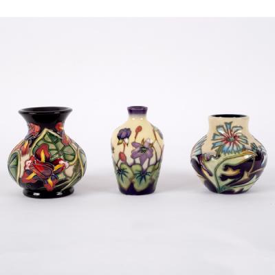 Moorcroft Pottery, three small vases: