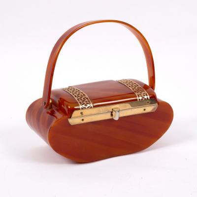 A 1940s bakelite handbag, casket