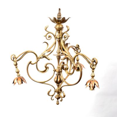 An Art Nouveau style brass pendant