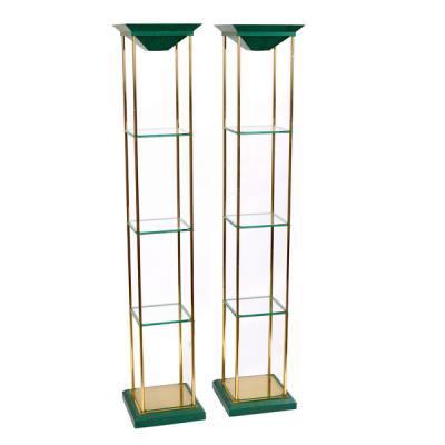 A pair of tall modern display stands,