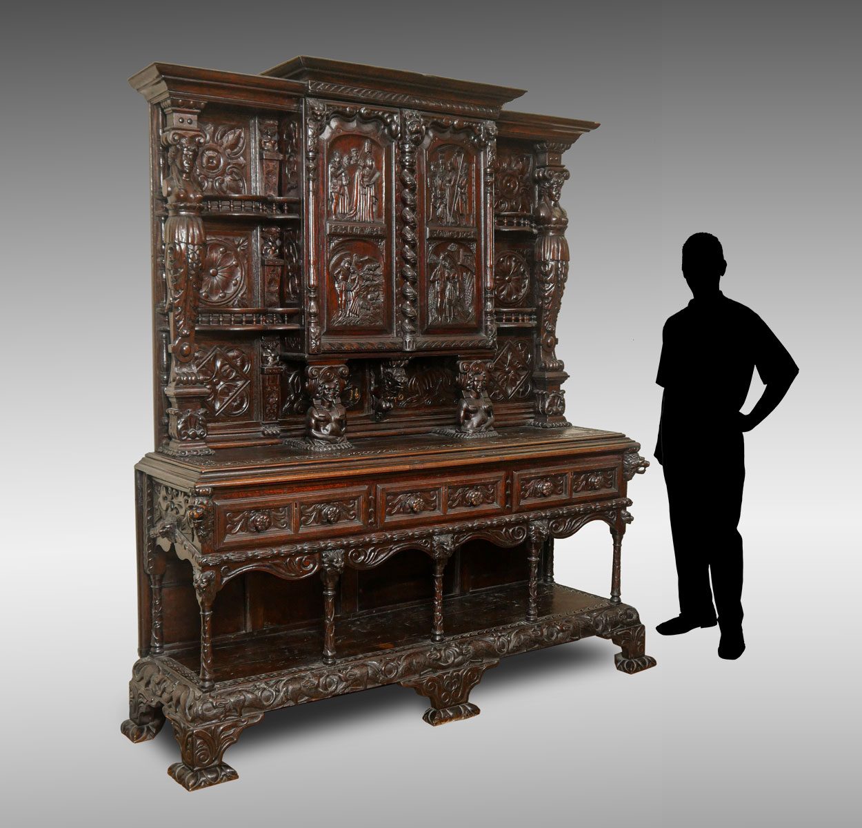 EARLY CARVED STEPBACK CUPBOARD: