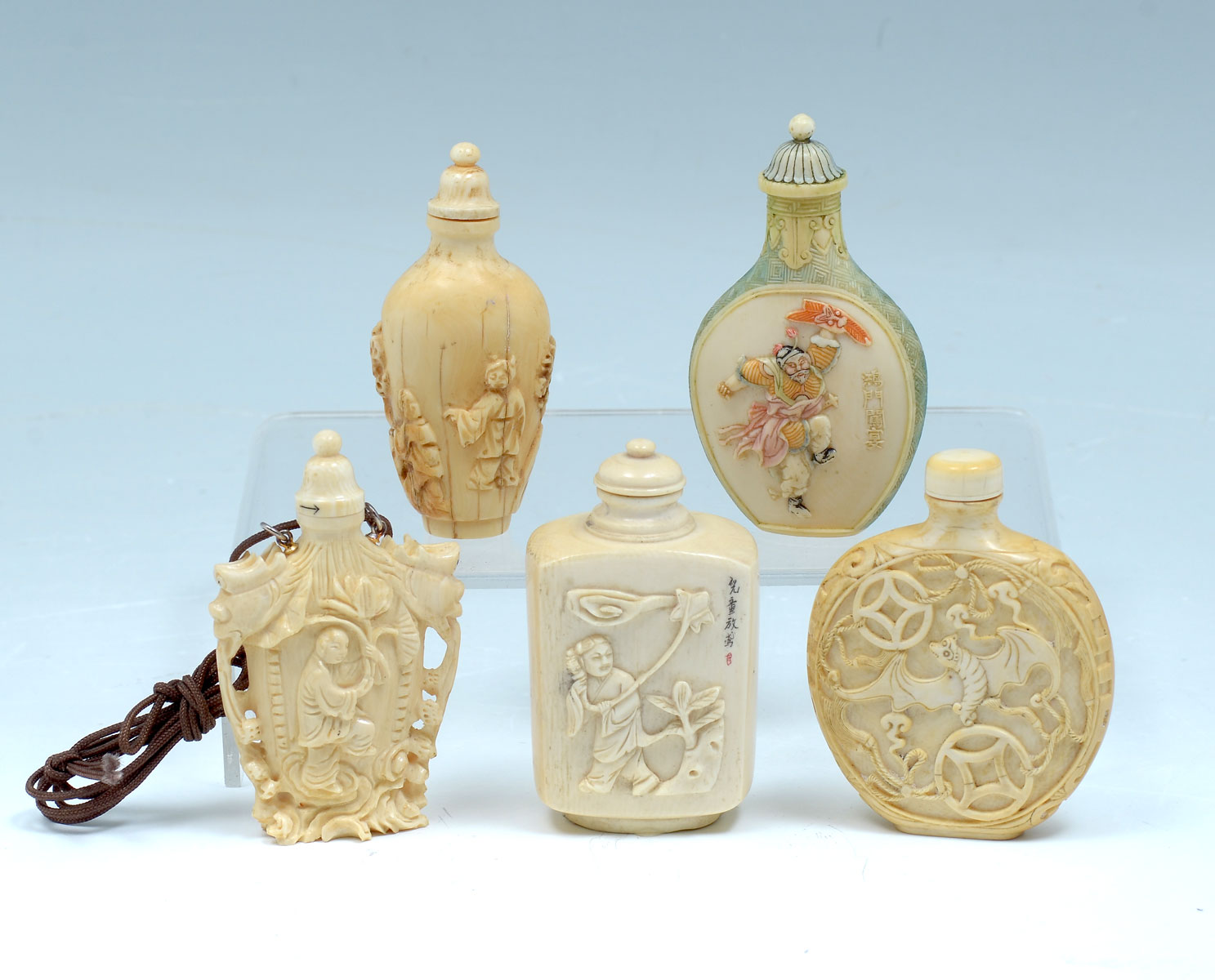 5 CHINESE CARVED IVORY SNUFF BOTTLES: