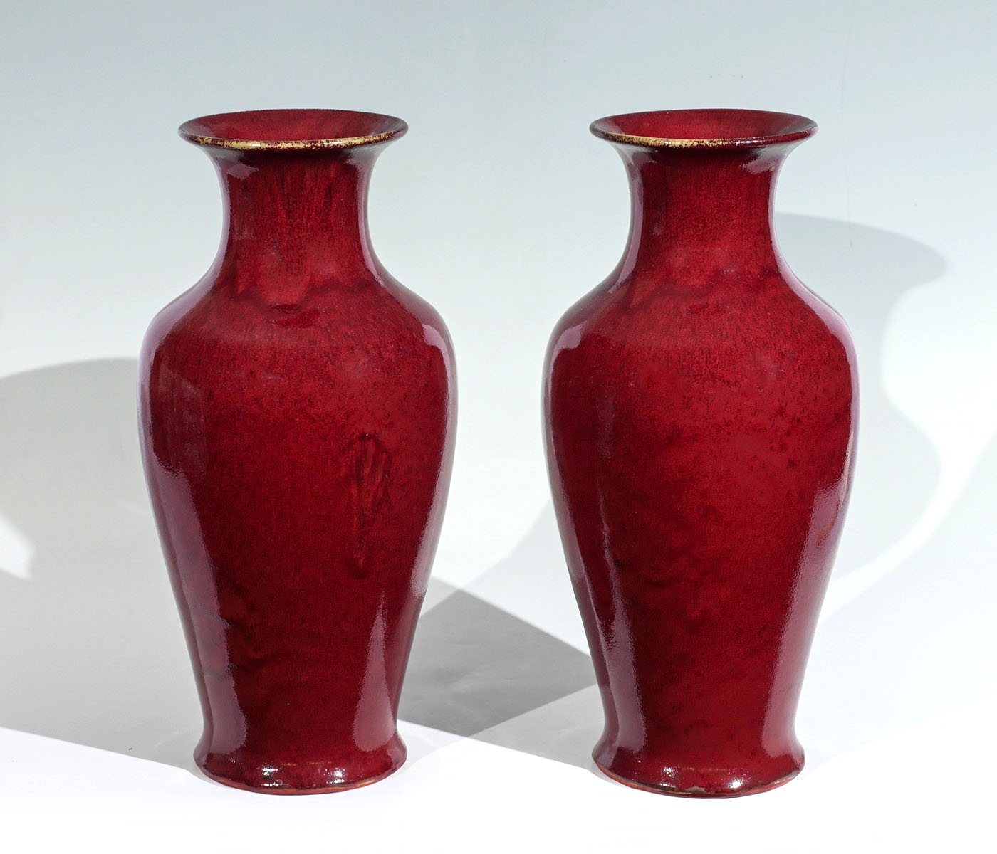 PAIR OF CHINESE RED GLAZED CONTEMPORARY