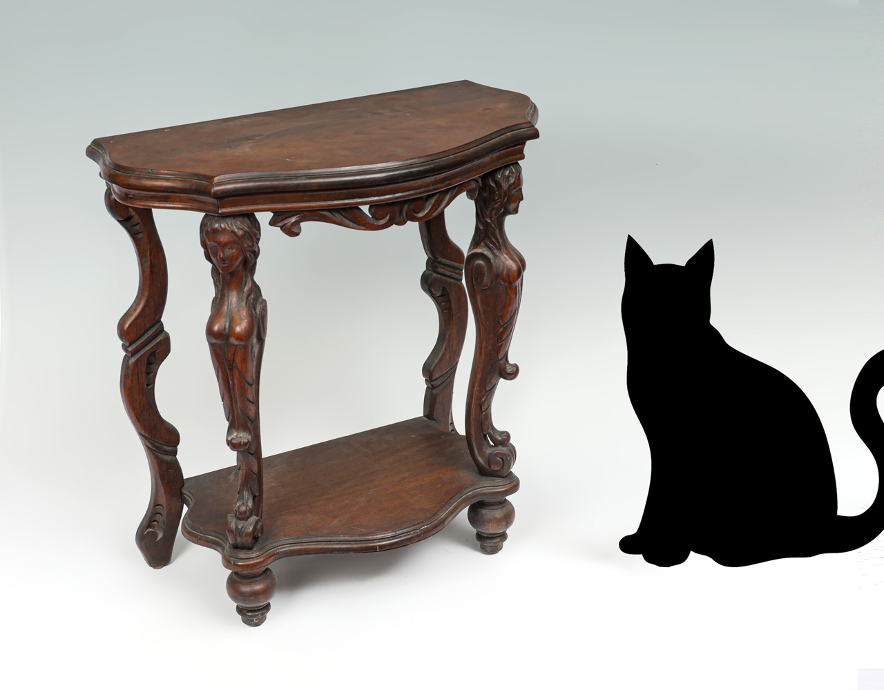 FIGURAL CARVED HALL TABLE: Carved