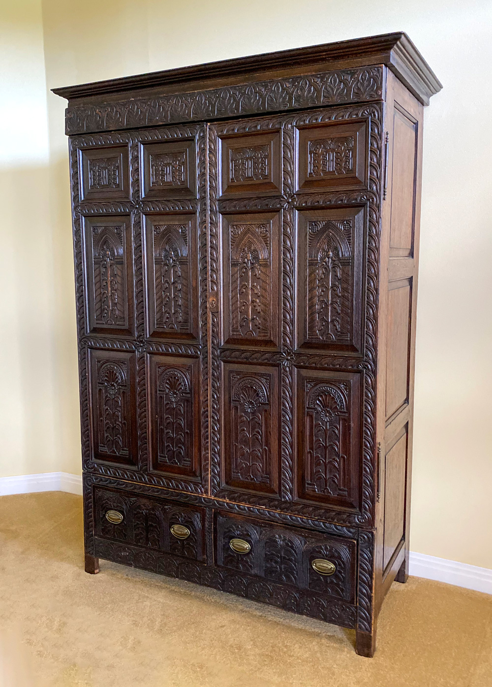 EARLY CARVED OAK ARMOIRE: Large