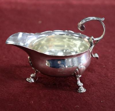 A George II silver butter boat,