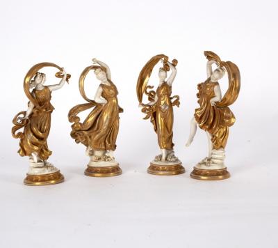 A set of four porcelain figures of dancing