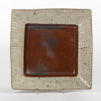 A square stoneware dish, by Shimaoka